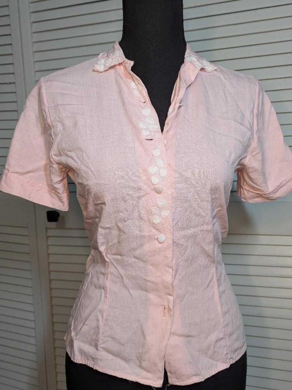 Pink button up blouse with white heart embroidery